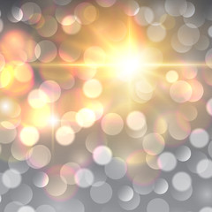 Christmas background, golden blurred lights, snowflakes and glittering bokeh 