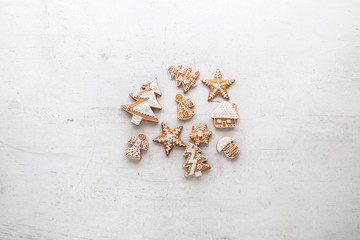 Gingerbread on white concrete background. Top of view