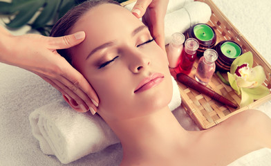 Massage and body  care. Spa body massage treatment. Woman having massage in the spa salon for...