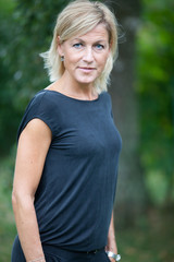 Obraz premium Portrait of a cute blond scandinavian woman shot outdoor
