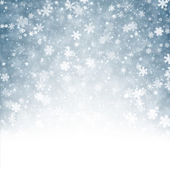 Blue winter background with snowflakes.