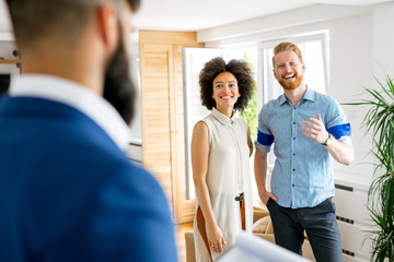 Young couple buying apartment