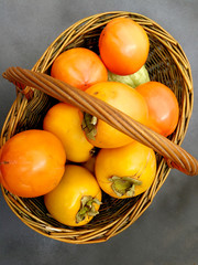 basket with persimmons