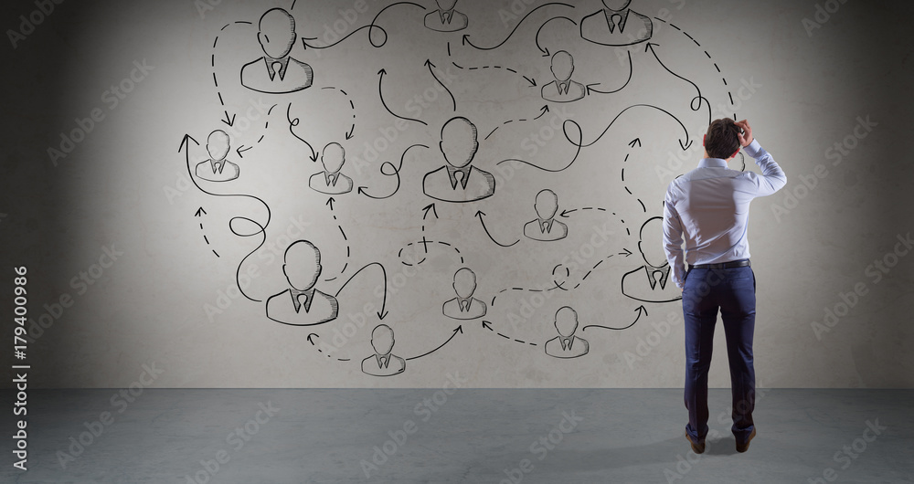 Poster businessman watching social network sketch on a wall 3d rendering