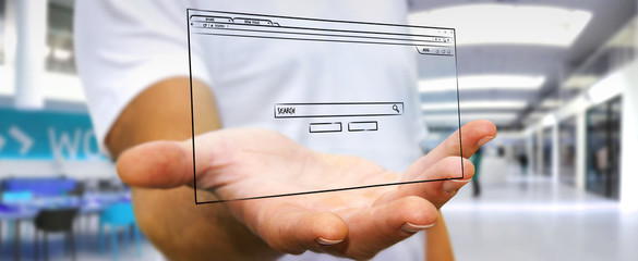 Businessman holding and touching a website page sketch