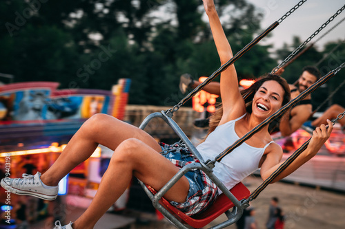 "Young couple enjoying on the swings" Stockfotos und lizenzfreie Bilder ...