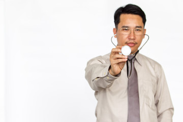 Asian doctor showing a stethoscope in the front close up on solid white background.
