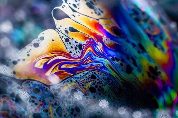 Fotobehang Prachtige psychedelische abstractie gevormd door licht op het oppervlak van een zeepbel © andrei310