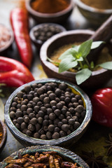 Spices and herbs in wooden bowls. Food and cuisine ingredients