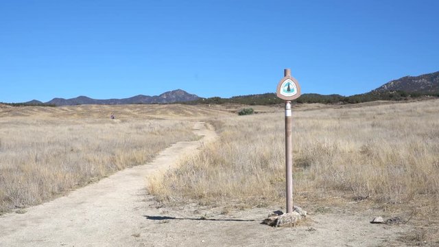 Woman hiking in PCT Trail, Warner Springs, California, United States