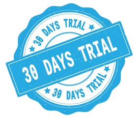 Fototapeta premium 30 DAYS TRIAL text, written on cyan round badge.