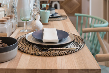 Fototapeta na wymiar table set on wooden dining table