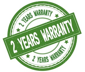 2 YEARS WARRANTY , written text on green round rubber stamp.