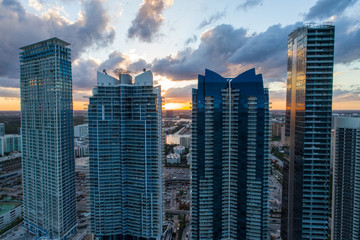 Aerial Sunny Isles Beach sunset and condominiums on the beach