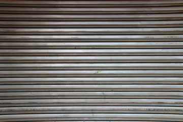 Fototapeta premium The iron gate with rusty and peeling paint