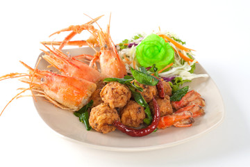 fried shrimp ball with head shrimp on white plate on white background