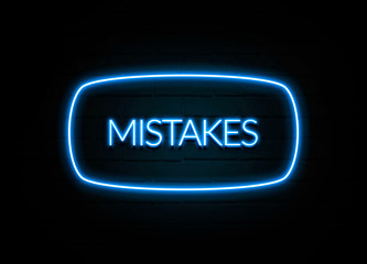 Mistakes  - colorful Neon Sign on brickwall