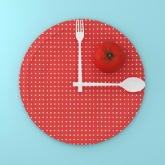Top view of Tomato on point pattern red round plate with spoon and fork in a form of clock on blue background. Food health concept diet decision. minimal food creative arrangement