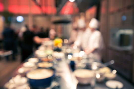Blurry background vintage color style of Chef in hotel or restaurant kitchen cooking for party
