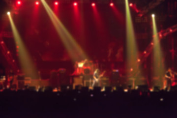 Fototapeta na wymiar blurry image background of musicians rock in big rock concert.