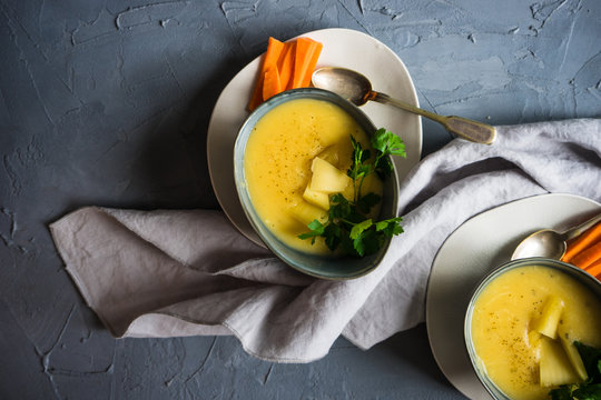 Cheese soup on concrete background