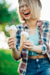 Happy girl eating ice cream and having fun