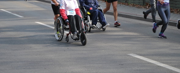 Niepełnosprawni maratończycy - obrazy, fototapety, plakaty