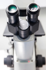 Fototapeta na wymiar Close up of stereo microscope eyepieces in the laboratory