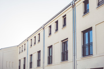 Fototapeta na wymiar industrial row houses with white facade