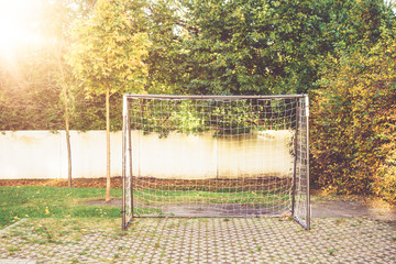 small soccer goal in backyard scene