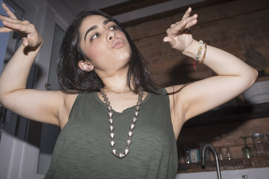Young woman dancing at a party