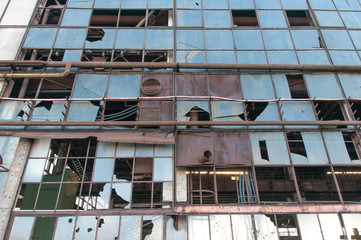 Old, abandoned factory, broken glass.