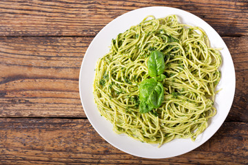 plate of pasta with pesto sauce
