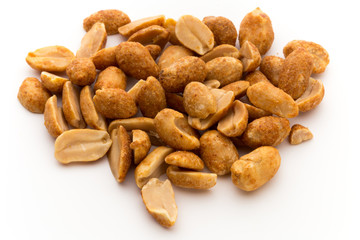 Peeled peanuts on the isolated background.