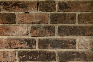 Old red bricks and white cement, wall texture