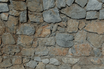 Granite texture, stone wall surface closeup