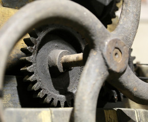 detail of an antique gear with toothed wheel