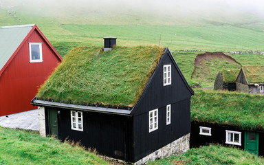 Fototapeta na wymiar typical houses with the grass roof in the Faroe Islands