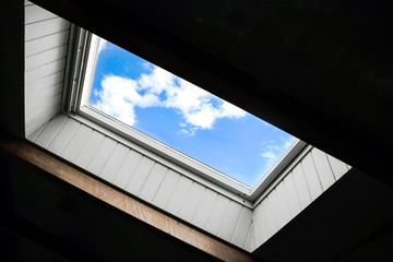 blue sky outside ceiling window