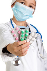 Advertisement of quality pills. Doctor with pills on the hands