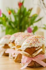 Traditional russian easter cake with  bright  decoration stand in group on the table. In background...
