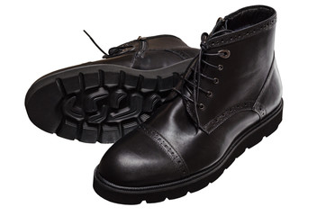high black winter boots with lacing and lock on the thick sole, of leather and fur, comfortable and warm in the cold season