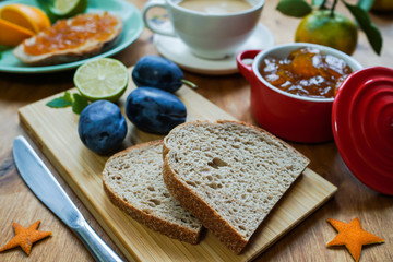 New Year's breakfast, coffee, bread, jam. Festive table setting.