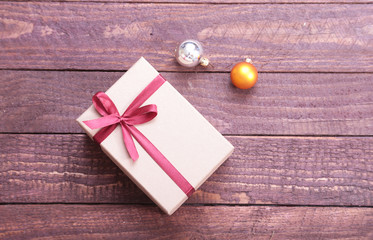 Gift boxes with bow on wood background