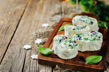 Turkey spinach ricotta dried cranberry roll ups