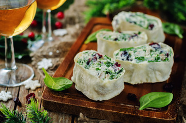 Turkey spinach ricotta dried cranberry roll ups