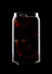 Glass of cold cola soda drink with ice cubes