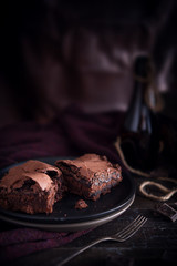 Brownie chocolate cake on dark moody background - 179464906