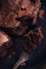 Brownie chocolate cake on dark moody background - 179464959