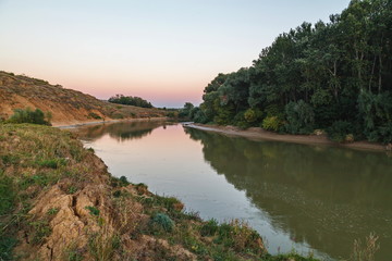 Fototapeta na wymiar The Rim of the River in the evening